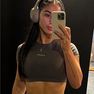 brand new Tahira gym top